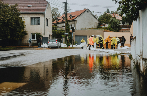 flooded street with homes